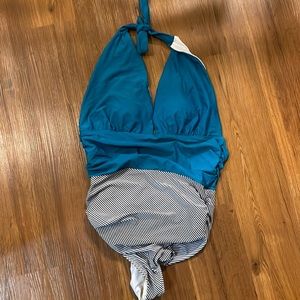 Turquoise with a stunning black and white attached bottom.